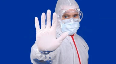 Doctor or Nurse Wearing Medical Personal Protective Equipment